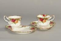 A pair of Royal Albert Old Country Roses plate and saucer twin sets.