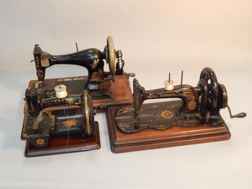 Two Singer sewing machines