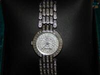 A boxed Diamond & Co ladies wrist watch.