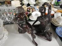 Two bronze style ballerina figures.