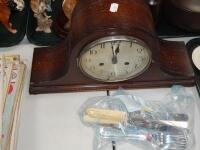 A 1930s oak cased Napoleons hat mantel clock