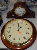 A Comitti of London mantel clock and Chesterfield wall clock.