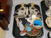 A selection of continental ceramics including a pair of spaniels.