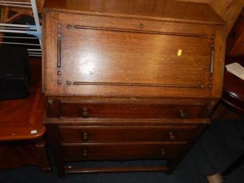 A 1930s oak bureau