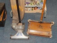 A vintage Ewbank sweeper and Viking ballbearing sweeper.