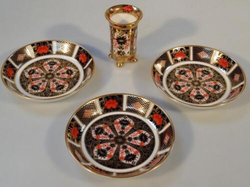 Three Royal Crown Derby Imari pattern pin trays and a cylindrical vase