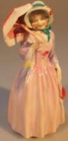 A Royal Doulton figure of Miss Demure (HN1402)