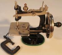 A Singer miniature sewing machine