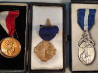 Three Masonic medallions