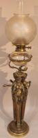 An early 20thC cast brass figural oil lamp