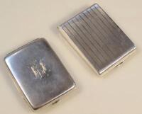 Two silver match book holders