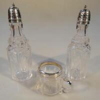 A pair of glass cruet bottles