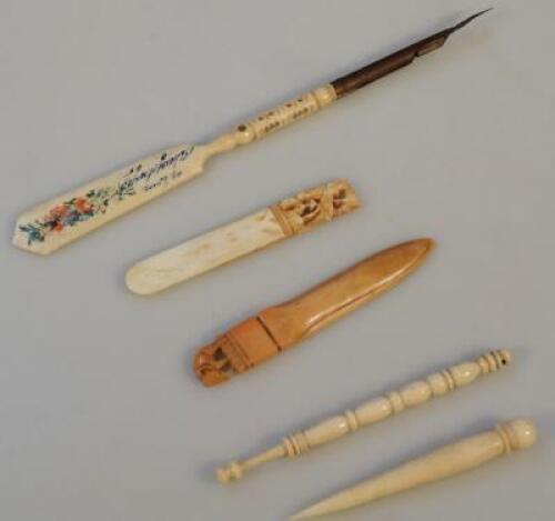 A bone Stanhope ink pen and lace bobbins