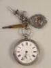 A silver cased fob watch and medallion