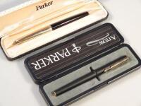 A Parker 61 fountain pen with rolled gold cap and another