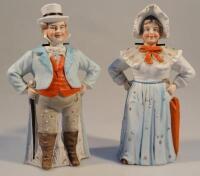 A pair of late 19th/early 20thC Continental fairing figures