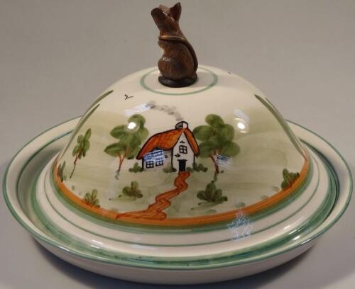 A Dartmoor ware circular pottery cheese dish and cover by the Bovey Pottery Co.