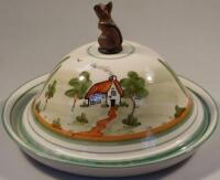 A Dartmoor ware circular pottery cheese dish and cover by the Bovey Pottery Co.