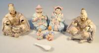 Three pairs of Continental bisque porcelain Oriental figures