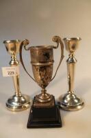 A pair of modern candlesticks and a George V silver prize cup