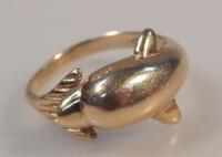 A dolphin shaped dress ring