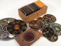 A 19thC magic lantern kaleidoscope slide and collection of German lantern slides and others