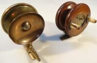 A Malloch's vintage brass side cast reel and a Nottingham style mahogany vintage fishing reel