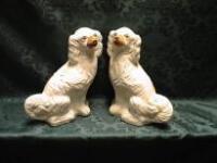 A pair of Staffordshire pottery spaniels