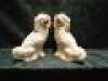 A pair of Staffordshire pottery spaniels