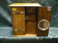 An Edwardian oak smoker's cabinet