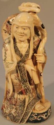 A Chinese figure of a Hotei