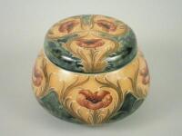 A Macintyre William Moorcroft tube lined tobacco jar and cover