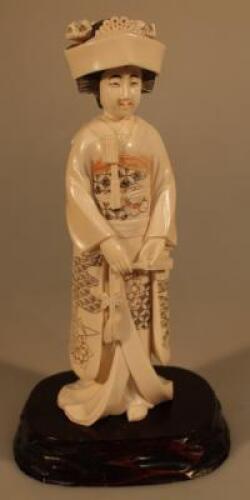 An early 20th century mammoth ivory figure of a Geisha girl