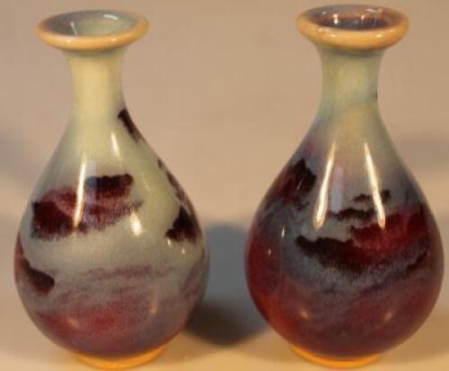 A pair of globular vases