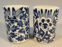 A pair of Chinese blue and white jars or brush pots