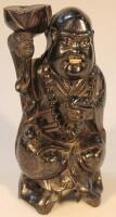 A Chinese hardwood figure group of a Hotei