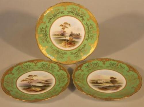 A set of three Coalport cabinet plates