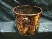 An Art Nouveau copper coal bucket