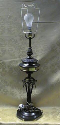 A brass table lamp of neo classical influence