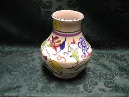 A modern Poole pottery baluster jug painted overall with flowers