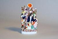 A 19thC Staffordshire flatback spill vase