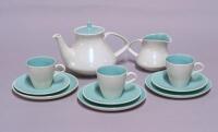 A Poole white & turquoise glazed part tea service