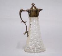 An Edwardian cut glass claret jug