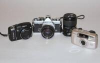 A quantity of various cameras to include Olympus