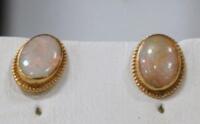 A pair of 9ct gold and opal earrings