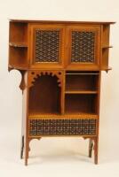 An Edwardian mahogany cabinet by Liberty of London