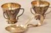 A pair of urn shaped silver salts