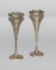 A pair of Edward VII silver Art Nouveau vases