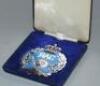 A QEII Queens Silver Jubilee commemorative RAC badge