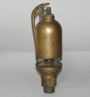 A brass steam train whistle